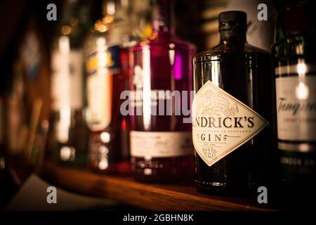 Bucharest, Romania - August 5, 2021: Illustrative editorial image of a Hendrick's gin bottle in a pub.