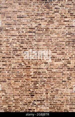 Brown and black brick wall. Close-up Stock Photo