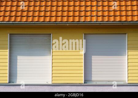Facade With Windows And Closed Roller Shutter, North Rhine-Westphalia, Germany, Europe Stock Photo