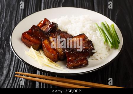 Famous Dish in Okinawa Rafute Dongbo Pork closeup in the plate on the table. Horizontal Stock Photo