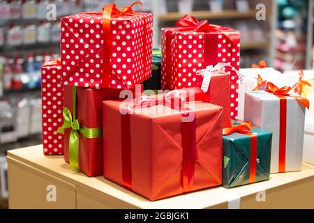 Many gift boxes tied with bows. Gifts concept. Stock Photo
