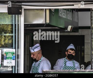 Ankara, Turkey. 04th Aug, 2021. Chefs wearing protective face masks stand inside their restaurant amid the coronavirus (COVID-19) pandemic in Ankara, Turkey, on Wednesday, August 4, 2021. Turkey reported over 24,000 daily coronavirus cases on August 3. (Photo by Altan Gocher/GocherImagery/Sipa USA) Credit: Sipa USA/Alamy Live News Stock Photo