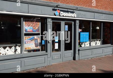 BILLERICAY, UNITED KINGDOM - Jun 13, 2021: A Domino's pizza shop in the High Street, Billericay, Essex, UK Stock Photo