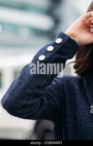 Cropped photo of stylish young woman outdoors Stock Photo