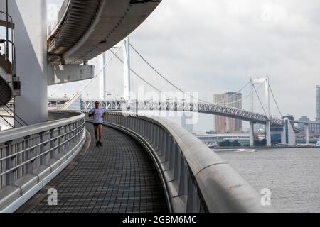 Tokyo, Japan. 28th July, 2021. The Rainbow bridge connecting Shibaura to Odaiba island. (Photo by Tanja Houwerzijl/SOPA Images/Sipa USA) Credit: Sipa USA/Alamy Live News Stock Photo