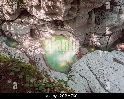 A seething clear light green river flowing in gorge between relief canyons. Magnificent southern nature Stock Photo