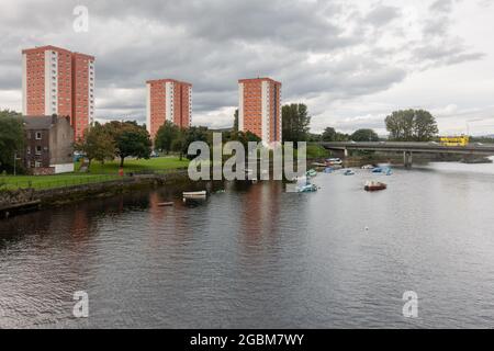 High rise tower blocks rise from the banks of the River Leven on the West Bridgend council estate in Dumbarton, Scotland. Stock Photo