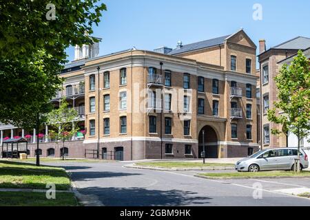 Bowes Lyon Court, a new build retirement apartment building taking inspiration from the architecture of Victorian warehouses and mills, in Poundbury n Stock Photo