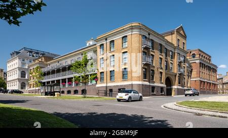 Bowes Lyon Court, a new build retirement apartment building taking inspiration from the architecture of Victorian warehouses and mills, in Poundbury n Stock Photo