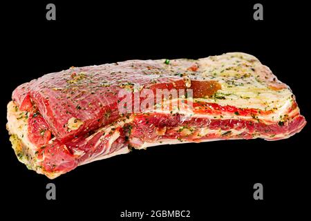 Beef meat marinated on black background. Raw beef ribs marinated isolate. Stock Photo