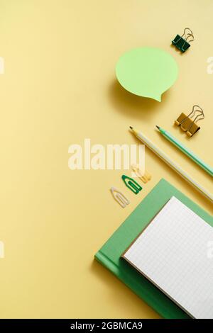 Creative workplace top view. Education, learning, study stationary on the table with copy space. Blank paper notepad for diary, plan flat lay Stock Photo