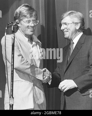 Austin Texas USA, circa 1986: Texas Gov. Mark White (right) greets actor Robert Redford at the Paramount Theater. ©Bob Daemmrich Stock Photo