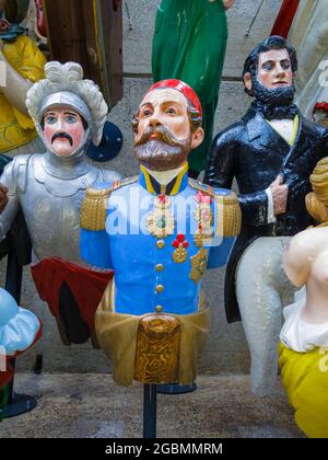 Display of traditional figureheads in the Cutty Sark, a British clipper ship and popular tourist attraction in dry dock in Greenwich, London, England Stock Photo