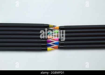 foreground of set of colored self-tips pens and markers on white background Stock Photo