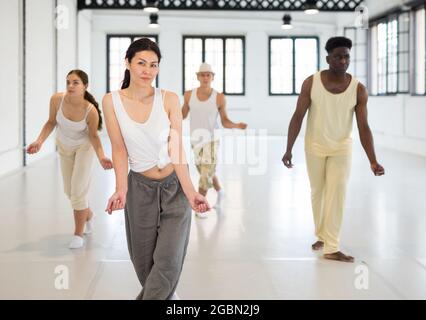 Dancers training swing movements Stock Photo