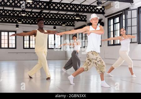 Dancers training modern dance movements Stock Photo