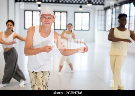 Dancers training swing movements Stock Photo