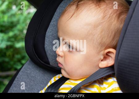 Baby boy in car seat. Child safety  Stock Photo