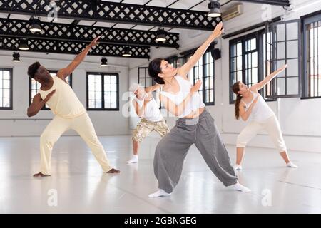 Dancers training modern dance movements Stock Photo