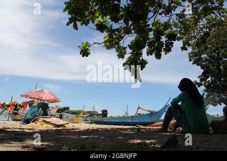 JEMBER, INDONESIA - February 14, 2016: Beautiful view of Papuma beach in the daytime Stock Photo