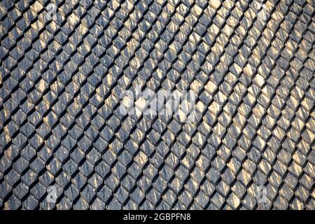 Church roof made of tarred wood. Abstract background Stock Photo