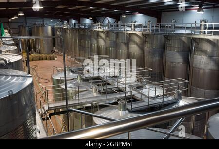 Shop with processing cisterns in wine plant Stock Photo
