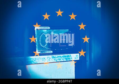 Open sign in the middle of the European Flag, concept of Re-opening in Europe after Coronavirus. Stock Photo