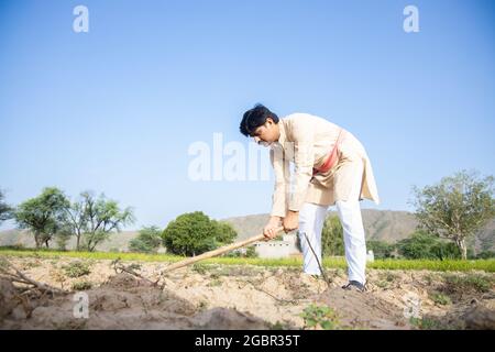 Indian farmer working in his field Andhra Pradesh South India Stock ...