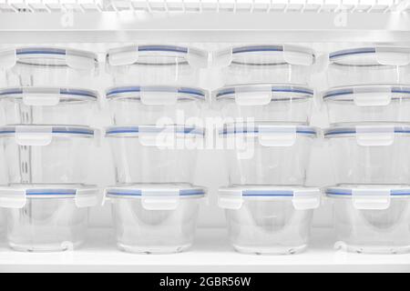 Reusable food containers. Containers for storing food. Responsible use of resources. Transparent plastic food storage containers. Stock Photo