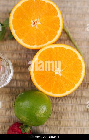 Close up of sliced orange on the table outdoors Stock Photo