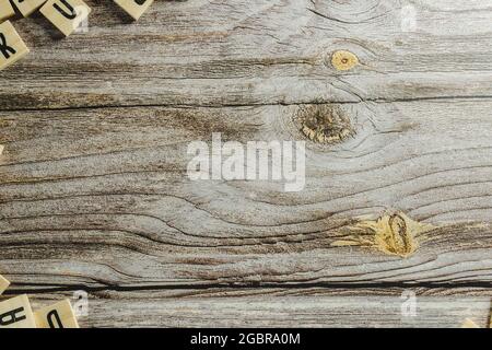 empty space on a wooden background Word Written In Wooden Cube on wood background Stock Photo