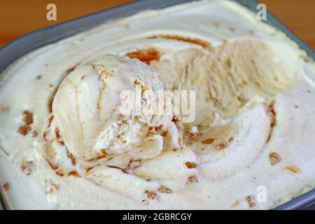 Closeup the Texture of Mouthwatering Salted Caramel Macadamia Nut Ice Cream Stock Photo