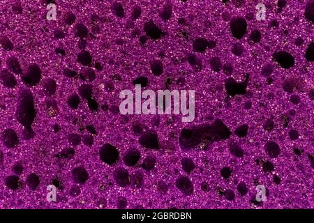 Purple sponge texture background, high detailed pattern surface Stock Photo