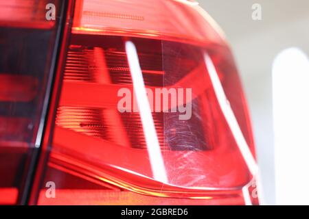 Closeup of polished car headlight before and after Stock Photo