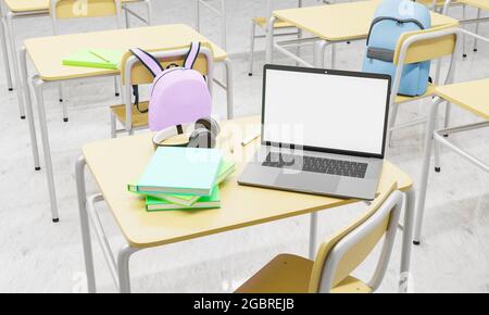 laptop with blank screen on a school desk in a classroom with books and supplies around. concept of education, back to school and technology. 3d rende Stock Photo