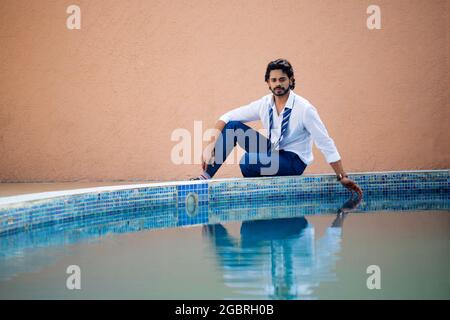 Young male model in garden Stock Photo