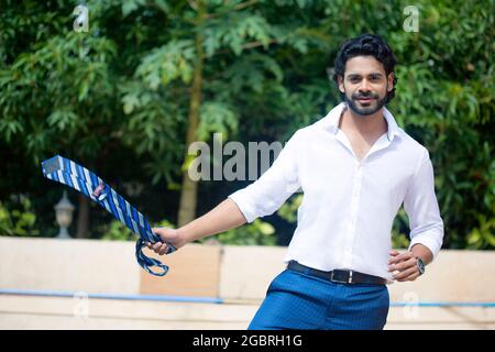 Young male model in garden Stock Photo