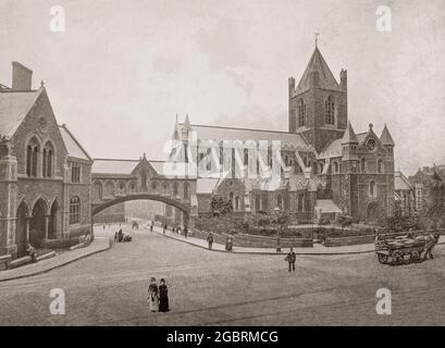 A late 19th century view of Christ Church Cathedral, aka The Cathedral of the Holy Trinity in Dublin, Ireland. The cathedral was founded in the early 11th century under the Viking king Sitric, rebuilt in stone in the late 12th century by Strongbow. After a partial collapse in the 16th century it was renovated and rebuilt from 1871 to 1878 by George Edmund Street, the flying buttresses were added along with the adjacent Synod Hall, linked to the cathedral by the iconic covered footbridge. Christ Church the is cathedral of the Dublin diocese and St Patrick's the national cathedral. Stock Photo