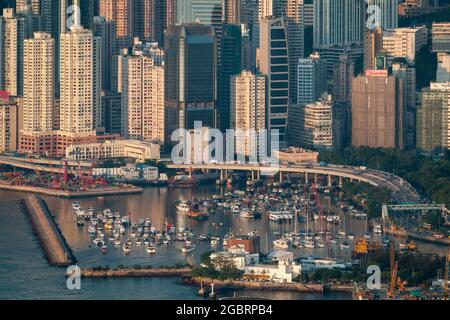 The typhoon shelter, elevated road of Island East Corridor, and high-rise commercial and residential buildings of Causeway Bay, Hong Kong Island Stock Photo