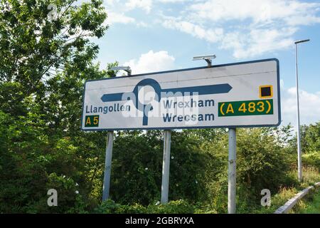 Road signs on the A5 and A483 road between Wrexham and Llangollen in Chirk North East Wales Stock Photo