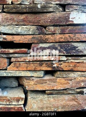 stone cladding on the facade of a house Stock Photo