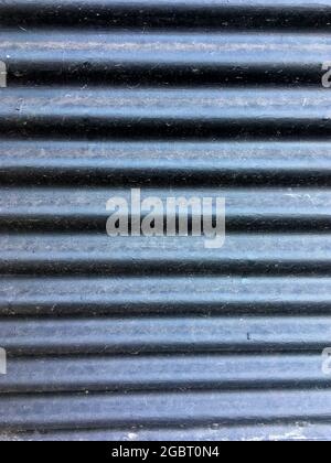 Close up of dark corrugated metal texture Stock Photo