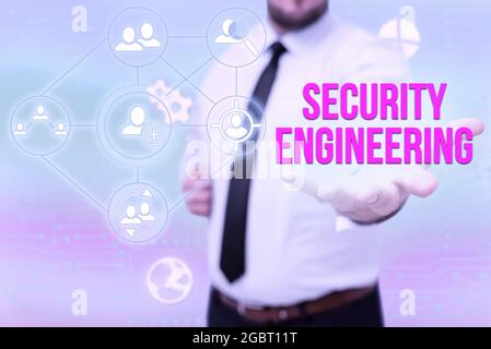 Hand writing sign Security Engineering. Word for focus on the security aspects in the design of systems Gentelman Uniform Standing Holding New Stock Photo