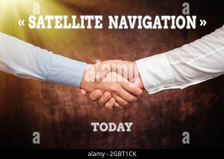 Sign displaying Satellite Navigation. Concept meaning system providing autonomous geospatial positioning Two Professional Well-Dressed Corporate Stock Photo