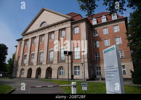 Berlin, Germany. 05th Aug, 2021. Blue skies can be seen above the Siemens administration building in Siemensstadt. The urban development framework agreement for the realization of Siemensstadt² was signed today in the Rotes Rathaus. Credit: Paul Zinken/dpa/Alamy Live News Stock Photo