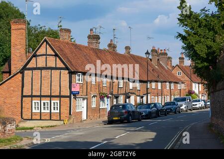 Row of old red brick cottages along the High Street at Old Amersham, Buckinghamshire, Southern England Stock Photo