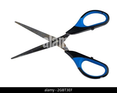 Rusty scissors blade with blue black handle isolated on white background with clipping path. Old dirty open pair of cutters. Close up shot Stock Photo