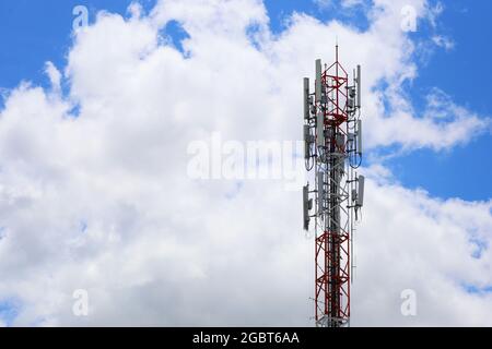 Telephone tower on cloud background and have copy space for design in your work. Stock Photo