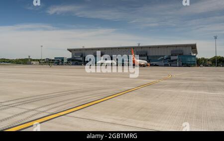 Ukraine, Odessa - July 16, 2021: New Odesa airport terminal ODS. Travel and flights. Passenger aircraft Boeing 737-8Z0 SkyUp Airlines aircraft - UR Stock Photo