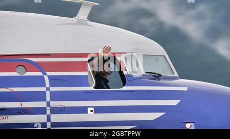 Zeltweg, Austria SEPTEMBER, 6, 2019 Pilot of a vintage airliner greets from the window. Douglas DC-6 by Red Bull preciously of Yugoslavian Prime Minister Josip Broz Tito  Stock Photo